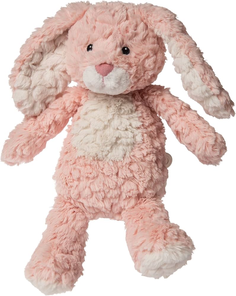 Pink plush bunny toy on a white background