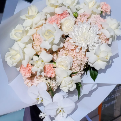 Elegance in Bloom arrangement White roses, orchids, hydrangea
